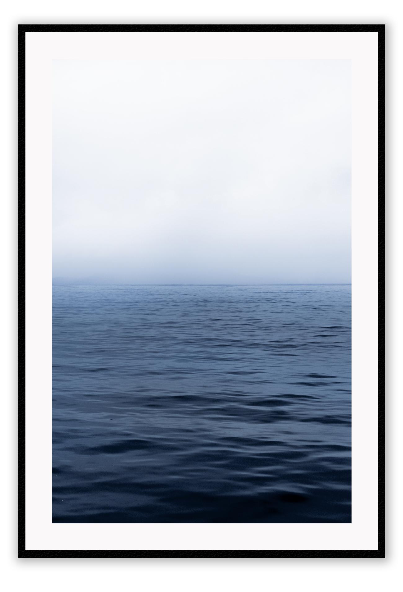 Photography print with ripples in water and ombre blue to white cloud